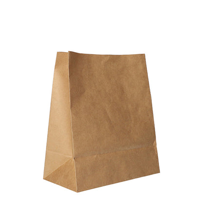 A PAPSTAR 250 block bottom bag from PAPSTAR GmbH made of brown kraft paper stands upright on a white background. The bag is empty, no handles or prints are visible.