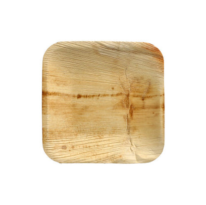 The PAPSTAR 25 plates palm leaf "pure" of PAPSTAR GmbH is a square, flat plate made of natural palm leaf with unique wood grain and color variations on a white background - ideal for eco-conscious dining.
