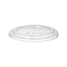A PAPSTAR 50 lid for salad bowls, round clear 2 cm height PLA of PAPSTAR GmbH is depicted lying flat on a white background. This compostable, eco-friendly lid fits disposable cups or containers.