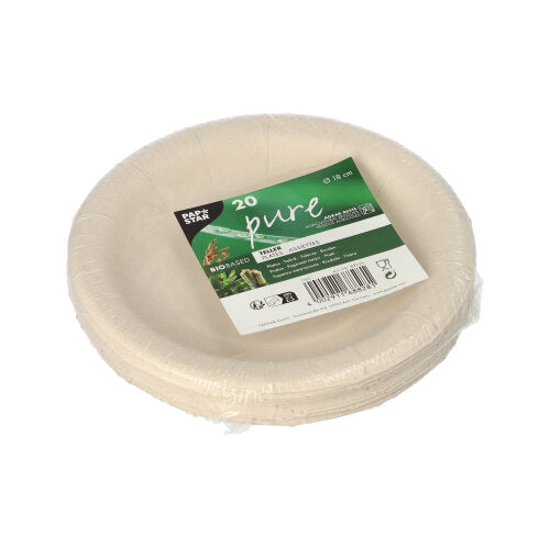 A stack of round PAPSTAR "pure" plates made from agricultural residues, wrapped in plastic foil. The label shows PAPSTAR GmbH, and they are 20 compostable and biodegradable plates.