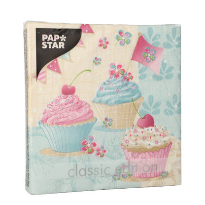 A pack of 20 PAPSTAR napkins, 33x33 cm, 3-ply, 1/4-fold from Design Set 6 by PAPSTAR GmbH, features cupcakes, cherries, flowers, and pennants on a light blue-beige background.