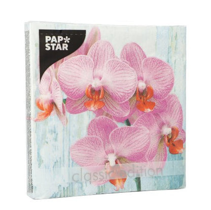 A pack of 20 PAPSTAR GmbH 3-ply napkins (33x33 cm, 1/4 fold) with set 2 design: pink and orange orchids on a light blue, textured background and visible branding in the top left corner of the packaging.