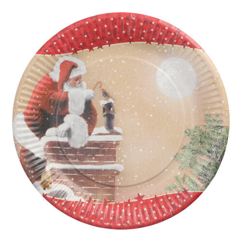 The PAPSTAR 10 plates, round cardboard Ø 23 cm from PAPSTAR GmbH shows Santa Claus on a snowy roof with a candy cane, full moon, and snowflakes – ideal for festive parties and events.