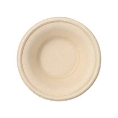 A simple, round PAPSTAR bowl made of sugarcane "pure", Ø 15.5 cm, natural, 380 ml from PAPSTAR GmbH in top view. The biodegradable bowl is characterized by a smooth, simple design with slightly raised edges and no visible decorations.
