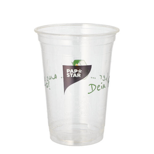 A clear PAPSTAR 50 PLA drinking cup "Cup made of corn" from PAPSTAR GmbH with green and black text. Biodegradable and eco-friendly. The empty cup is depicted against a plain white background.