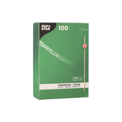 The green box of PAPSTAR 100 finger food picks by PAPSTAR GmbH shows a wooden pick image. The box contains 100 bamboo picks, each 12 cm long, with product information in several languages on the front.