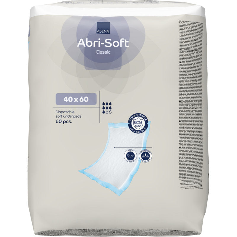 A pack of disposable underpads, Abri-Soft Classic, 40x60 cm, blue (60 pieces) by Abena Re-Seller GmbH. The packaging features product details, symbols, and a sketch of the underpad.