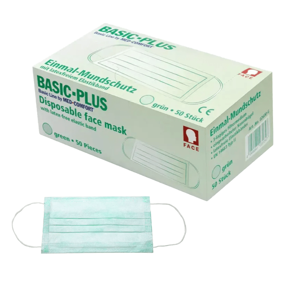 The image shows a box of AMPri BASIC-PLUS OP 3-ply masks, Type II, labeled “green, 50 pieces.” A clear image of a face mask is visible on the box. A green 3-ply face mask lies flat beneath the box. The mask features a latex-free elastic band and is manufactured by AMPri Handelsgesellschaft mbH.