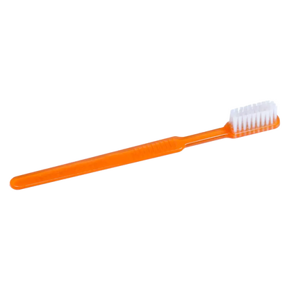 An AMPri MED-COMFORT Dental PS disposable toothbrush with toothpaste, with an orange handle and white bristles.