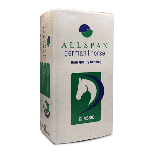 The Allspan German Horse Classic Wood Shavings Bedding Package features a green-and-blue horse-head logo with “CLASSIC” in white on a green background. This predominantly white, rectangular package with green and blue accents offers low-dust bedding for maximum comfort.
