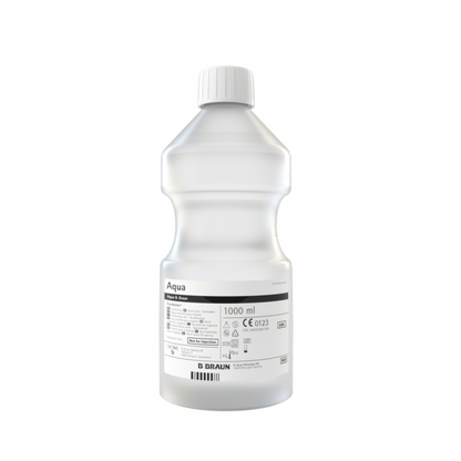 The B. Braun Aqua Ecotainer® Topical Rinse, a transparent plastic bottle with a capacity of 1000 ml, is made from eco-friendly polypropylene. It features a white cap and is labeled with various symbols and texts, including the B. Braun branding and instructions for using the topical rinse.