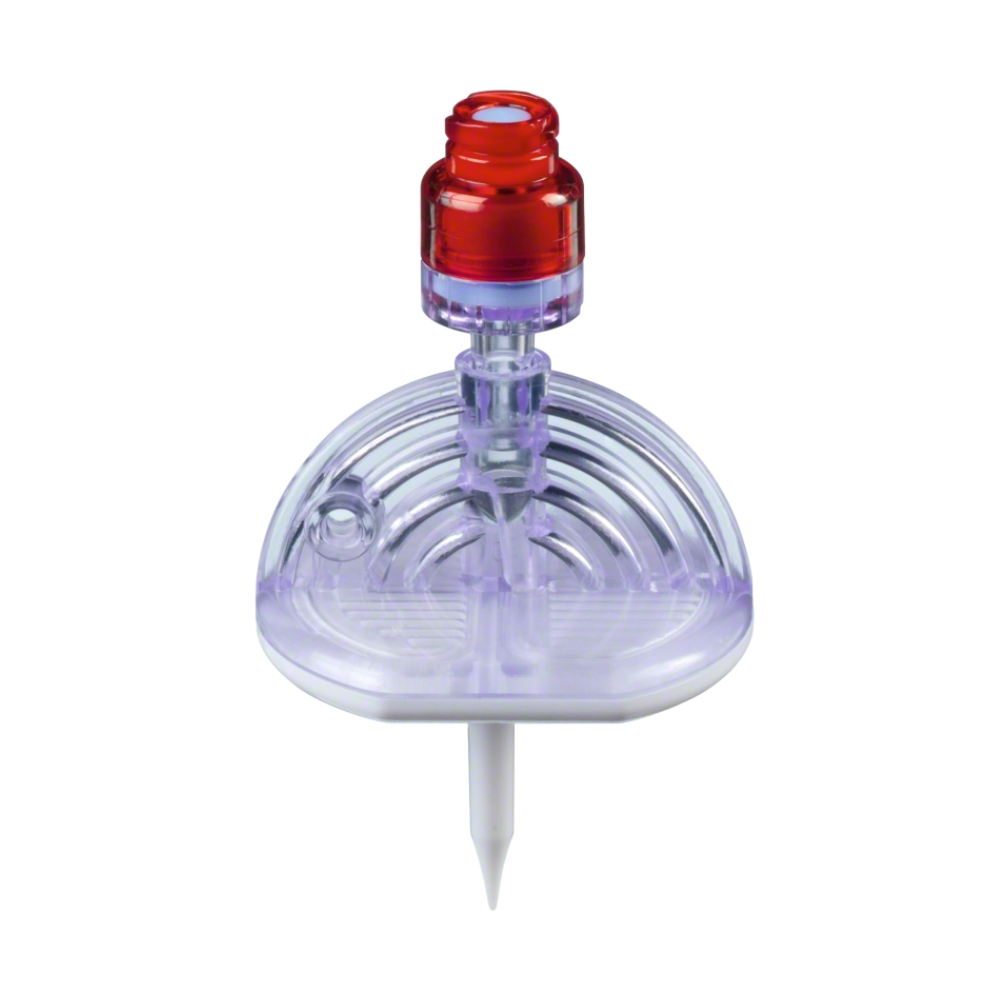 The B.Braun Mini-Spike® 2 Chemo Withdrawal and Injection Spike, manufactured by B. Braun Deutschland GmbH & Co. KG, features a transparent, domed plastic design with a striking red tip and a distinctive white base. Its circular patterned dome complements the hollow central column, which effortlessly connects with the red tip containing an integrated Safeflow valve to enhance safety.