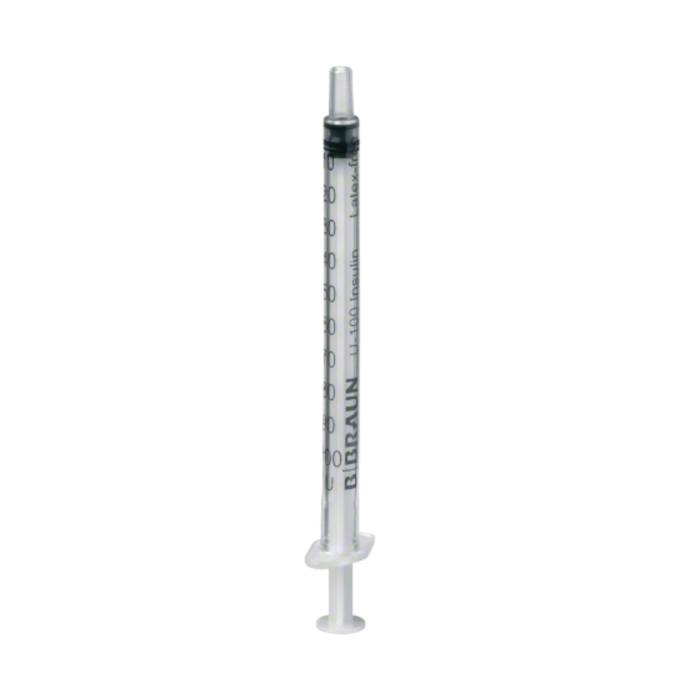 A transparent B.Braun Omnifix® 100 Solo disposable insulin syringe for U-100 insulin, designed for subcutaneous insulin injection, with a black plunger cap and measurement lines on the side as well as the inscription "BBRAUN", stands upright against a plain white background.