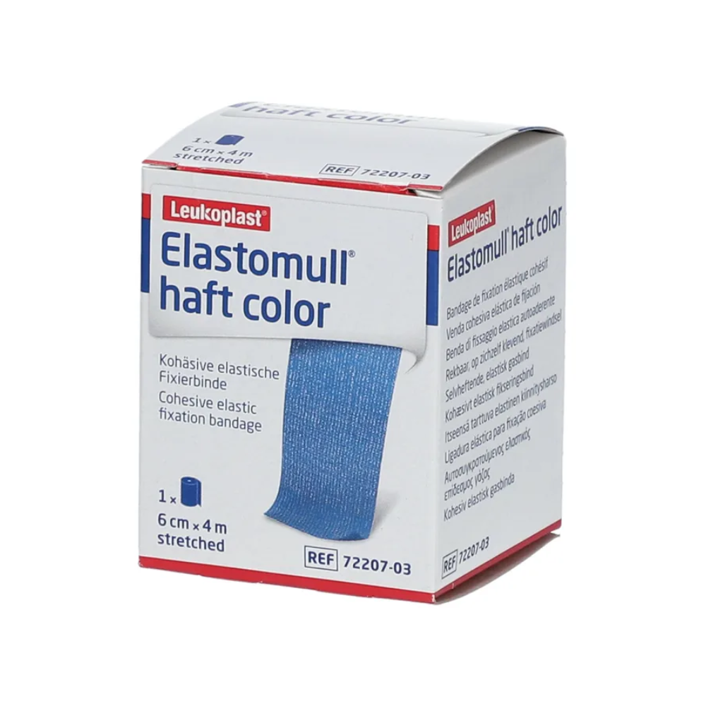 On the packaging of the BSN Elastomull® haft color fixation bandage from BSN Medical GmbH, a blue cohesive bandage is depicted. It includes information such as size (6 cm x 4 m stretched) and article number (72207-03) and highlights its function as an elastic fixation bandage.