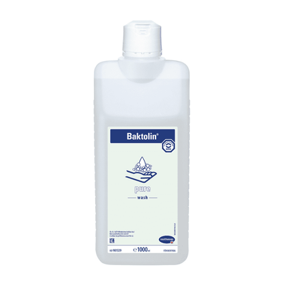 A 1000 ml bottle of Hartmann Baktolin® pure wash lotion with a white-blue label, a logo with two hands under water droplets, and formulated with skin-friendly surfactants.