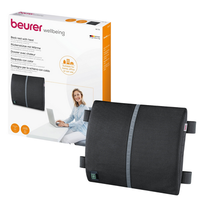Image of the Beurer HK 70 heating pad with back support from Beurer GmbH. The product is black with a gray stripe in the middle and features an adjustable strap and a control button. In the background, a woman can be seen on the packaging using the heating pad while working at a desk on a laptop.