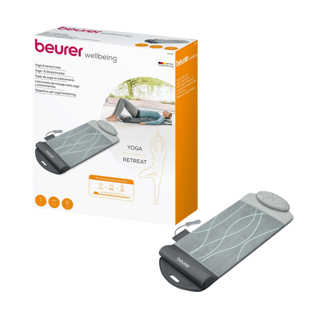 A Beurer MG 280 yoga and stretch mat in gray packaging with contours on the front. The label on the packaging highlights features such as automatic stretching exercises. The product from Beurer GmbH also includes a pillow and is stored in a partially opened package where the complete mat with its integrated vibration massage function can be seen.