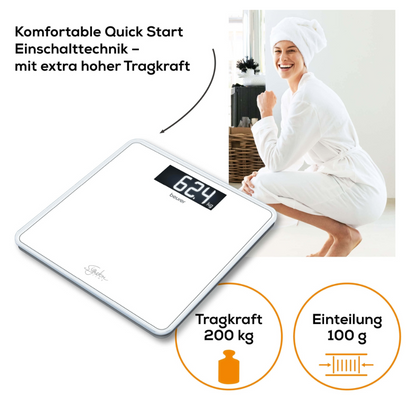 A person in a white bathrobe and towel crouches smiling next to a Beurer GS 400 body scale SignatureLine, showing 62.4 kg. The text highlights the scale's features: Quick Start technology, large safety glass platform, high weight capacity (200 kg), and precise measurement (100 g increments).