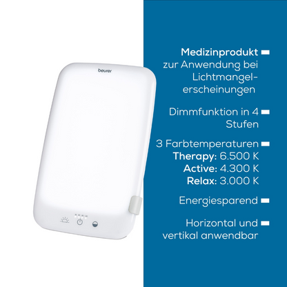 Image of the Beurer daylight lamp TL 35 on a white background. The lamp is white and rectangular with rounded edges. The text in the image describes the product features, including adjustable brightness with a dimmer, three color temperatures, and energy efficiency. The product is manufactured by Beurer GmbH and delivered in a package with one piece.