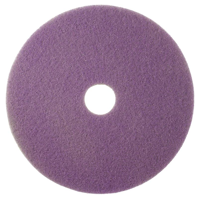 The Twister Pad purple, round from Diversey Deutschland GmbH & Co. OHG for the maintenance cleaning of coated hard floors is flat and textured, with a central hole and is shown on a white background.