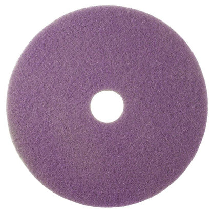 The Twister Pad purple, round from Diversey Deutschland GmbH & Co. OHG is a round, flat pad with a hole, coarse structure, and purple surface for the maintenance cleaning of coated hard floors, depicted against a white background.