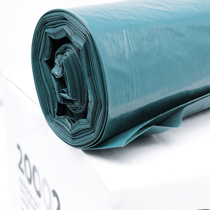 On a white box lies a large roll of dark green DEISS garbage bags 20002, with a volume of 120 liters. On the side, the number "2000" is printed in bold black. It represents the number of sturdy, easily unrolled garbage bags made from recycled PE by EMIL DEISS KG (GmbH + Co.).