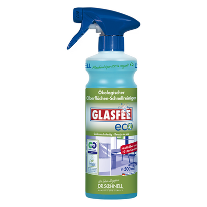 A 500 ml spray bottle with Dr. Schnell GlasFee Eco from DR.SCHNELL GmbH & Co. KGaA ensures residue-free cleaning. The green bottle with a blue spray cap featuring a house symbol and German text emphasizes its function as a ready-to-use, ecological quick cleaner for surfaces.