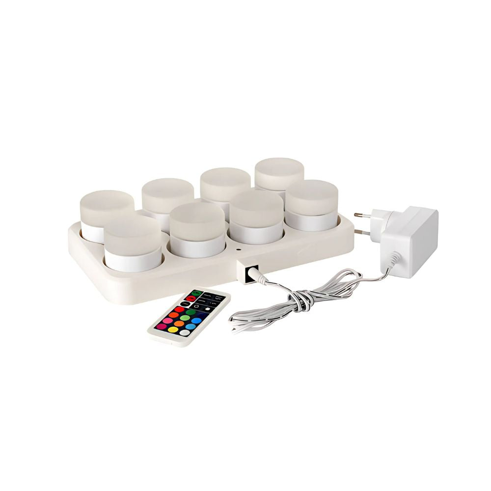 The Duni GmbH Multicolour LED Set, Mini (8 pieces) consists of eight mini LED lights for creative lighting, including remote control and power adapter, all on a simple white background.