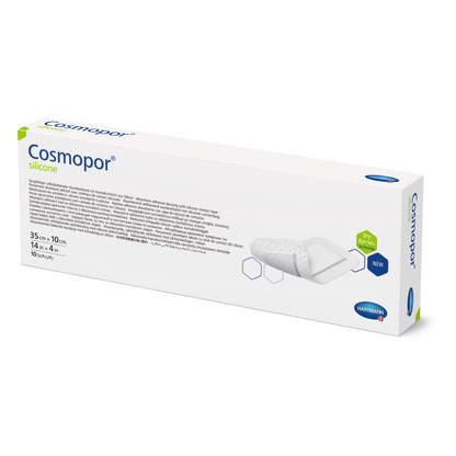 Box with sterile Cosmopor® silicone dressings by Paul Hartmann AG with product details and brand logo on a white background. The box is labeled with dimensions and quantity and indicates a new, improved formula.