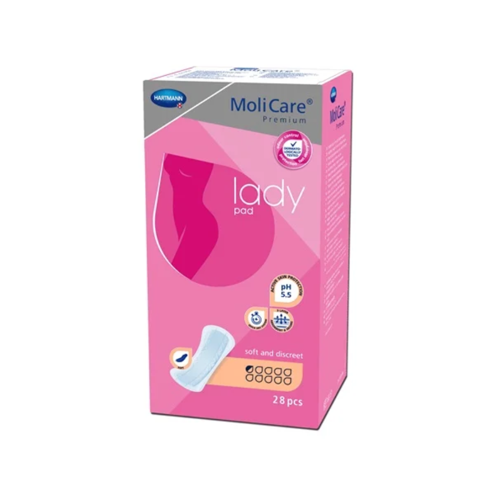 The image shows a pink box of Hartmann MoliCare® Premium lady pad inserts from Paul Hartmann AG. The box shows a stylized silhouette and product information, including the words "soft and discreet", "pH 5.5", and the quantity "28 pieces". Ideal for light bladder weakness, there is also a picture of a pad on the front.