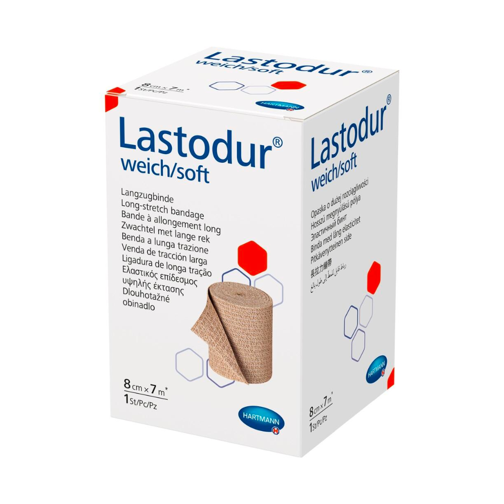 A product image of a Hartmann Lastodur® Soft long stretch bandage box by Paul Hartmann AG. The box is labeled for a long stretch bandage, mainly in white with blue and red text and details.
