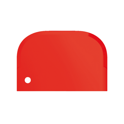 A bright red item with rounded edges and a shiny surface, reminiscent of the Haug scraper small 15 x 10 cm from Haug Bürsten KG. It features a small round hole in the lower left corner and is displayed against a plain white background.