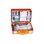 An open Holthaus Medical first aid kit QUICK, manufactured by Holthaus Medical GmbH & Co. KG, contains various medical supplies, including bandages, adhesive plasters, antiseptic wipes, and medical swabs. The items are neatly arranged in compartments in the case made of durable ABS plastic, produced according to DIN 13157.