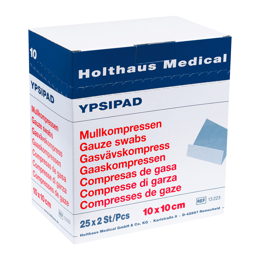 In a blue and white box of Holthaus YPSIPAD gauze compress from Holthaus Medical GmbH & Co. KG, there are 25 packs, each with 2 sterile gauze swabs, each measuring 10 cm x 10 cm. The text on the box highlights their good absorbency and is printed in multiple languages.
