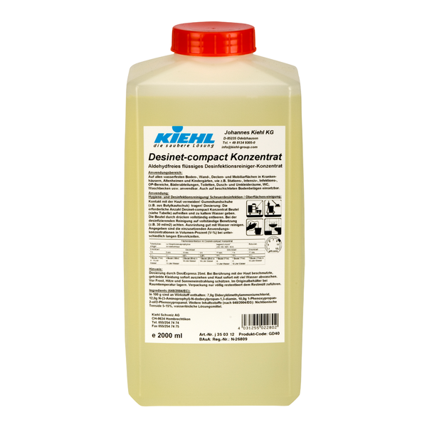 A rectangular 2-liter plastic container with a red cap and white label shows the brand Johannes Kiehl KG and the product details for Kiehl Desinet-compact Concentrate, an aldehyde-free liquid disinfectant cleaner concentrate in German.