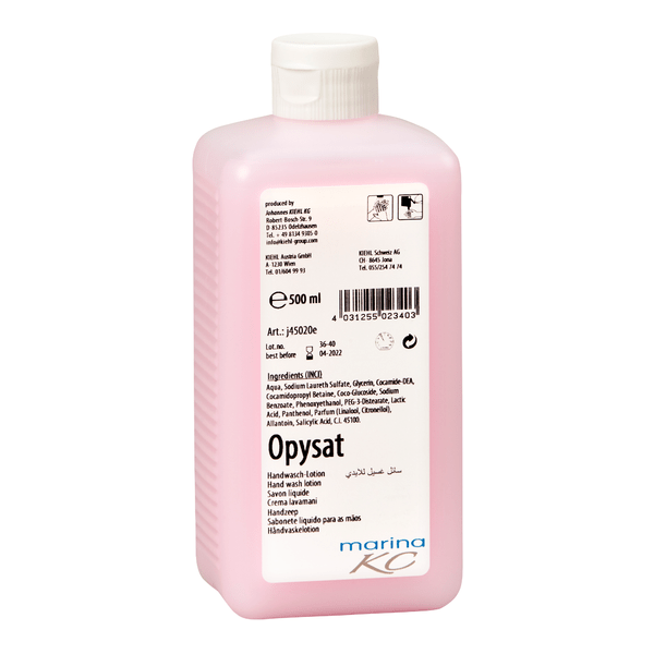 A pink 500 ml bottle of Kiehl Opysat hand wash lotion from Johannes Kiehl KG, a pH-neutral hand soap, has a white label with product information, ingredients, barcode, symbols, and "marina KC" at the bottom for gentle hand cleaning.