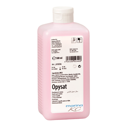 A pink 500 ml bottle of Kiehl Opysat hand wash lotion from Johannes Kiehl KG, a pH-neutral hand soap, has a white label with product information, ingredients, barcode, symbols, and "marina KC" at the bottom for gentle hand cleaning.