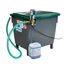 A large gray-green chemical dispenser with a hose, dosing system, and transparent tube leads to a container with liquid labeled "Kiehl Server special size on request | Package (1 piece)" by Johannes Kiehl KG.