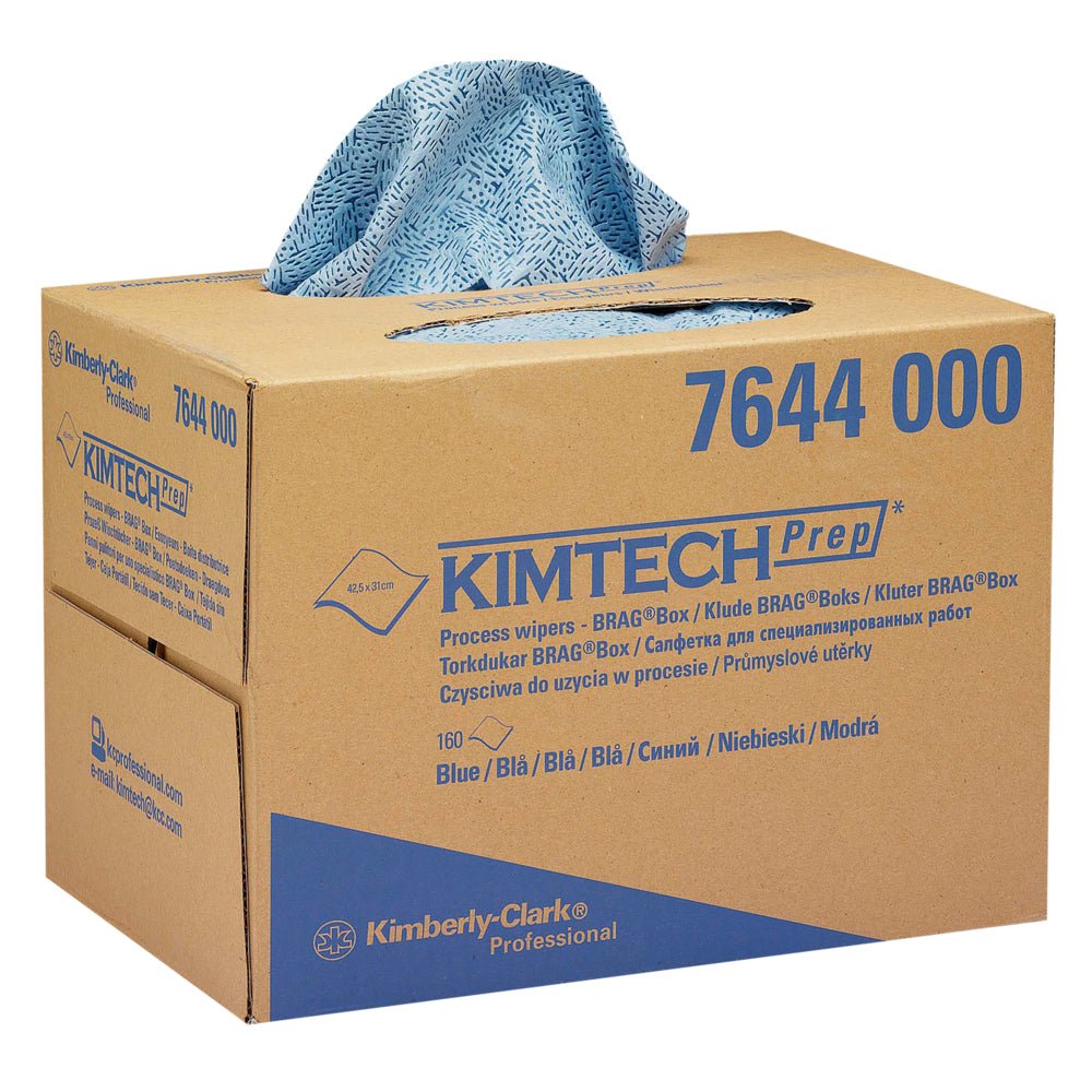 A blue patterned Kimtech® process wipe is dispensed from a brown Kimberly-Clark GmbH BRAG™ Box (1 box x 160 wipes). The box is labeled with product information and is ideal for industrial cleaning.
