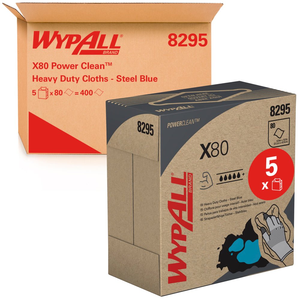 A brown box labeled "WypAll® X80 PowerClean - Pull-up Box / Steel Blue" from Kimberly-Clark GmbH stands behind a smaller matching box, both showing product details and an illustration of blue cleaning cloths. Contains 5 boxes with 80 sheets each.