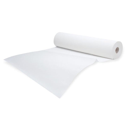 A roll of white Meditrade Rollicel® medical crepe paper, slightly unrolled against a plain white background. The roll is positioned diagonally, with the end bent slightly to the side.