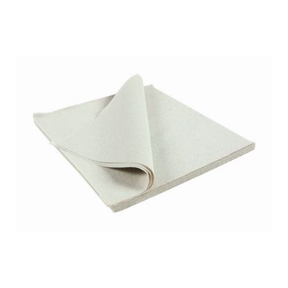 A folded square piece of Meditrade® cellulose in layers, 20 x 30 cm | Carton (3 bags) by Meditrade GmbH lies on a flat surface. The light fabric or paper appears plain without visible markings or structures, and one corner is folded up, making the underside visible – ideal for hygienic applications in medical needs.