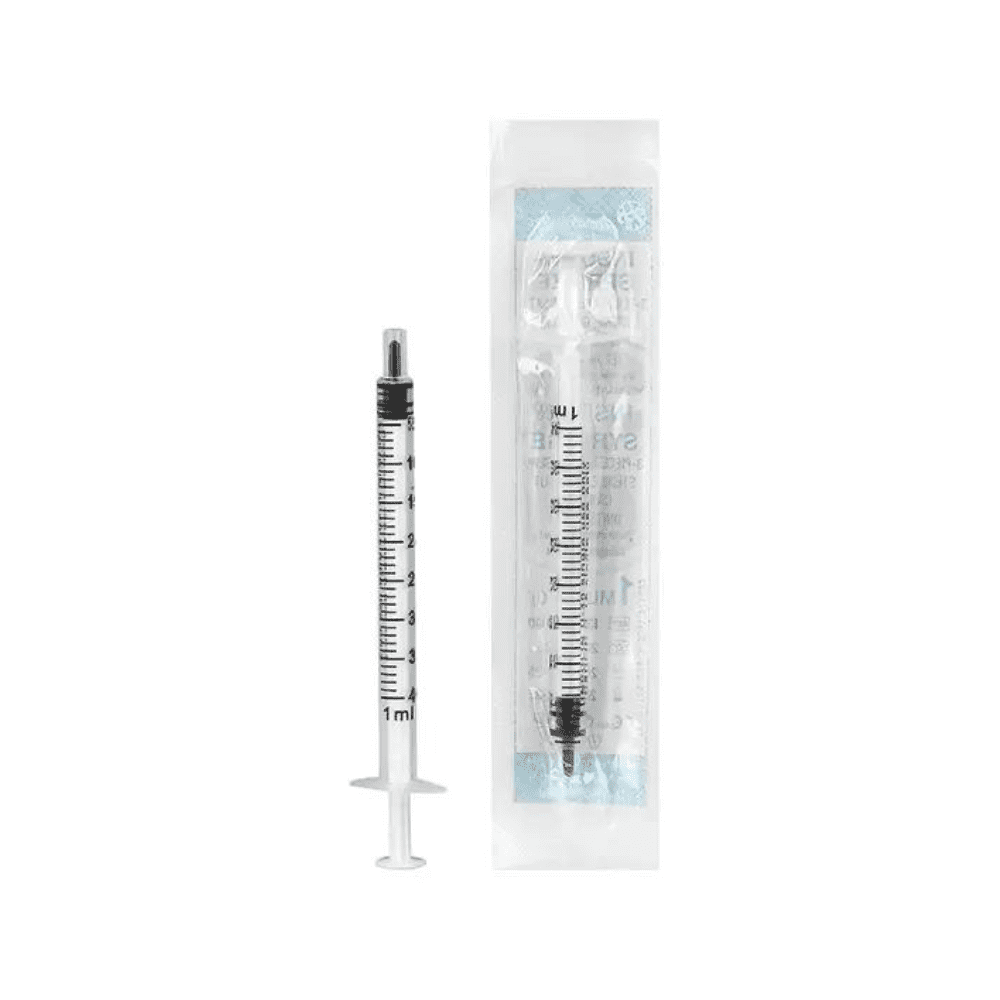 A 1 ml Mediware insulin syringe from Servoprax GmbH is shown next to its packaging. The syringe has a clear barrel with black measurement markings, including U 40 divisions, and a black plunger. There is visible text on the transparent packaging highlighting the Luer fitting for easy connection.