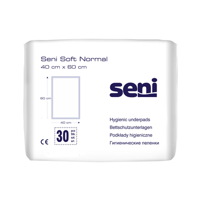 A pack of Seni Soft Normal bed protection pads from TZMO Deutschland GmbH (40 x 60 cm). The white pack with blue text and graphics contains 30 pieces and offers reliable protection and information in multiple languages.