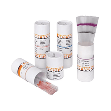 Five cylindrical containers are displayed with Servoprax ring-marked pipettes 50 + 100 µl. Some containers are open and release stacks of plastic tines or pipettes. These products from Servoprax GmbH have white designs with orange and black lettering.
