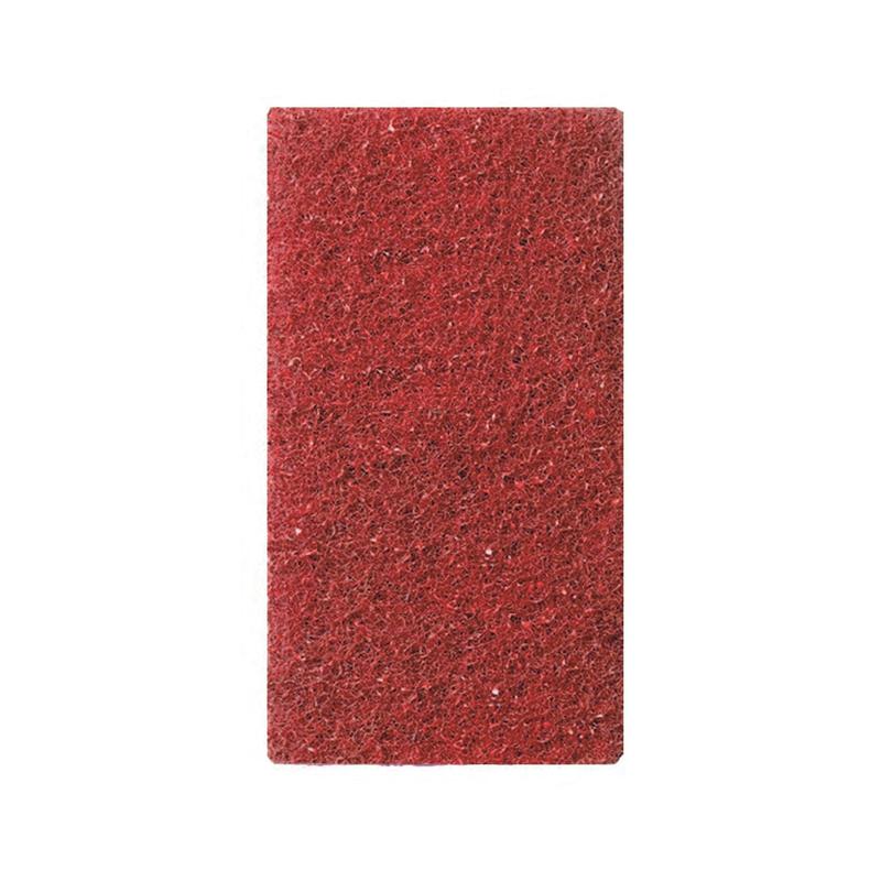 A rectangular red TASKI Twister Utility Handpad TXP from Diversey Deutschland GmbH & Co. OHG, with a textured surface, photographed against a solid white background. For manual cleaning of hard-to-reach areas or for use with edge cleaners.