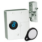 Pictured is a Novocal electronic transponder lock (1 piece) for drawers or doors in white with a round black sensor that carries a blue radio symbol; in front of it is a white key tag with a black border and the wall mount is attached.