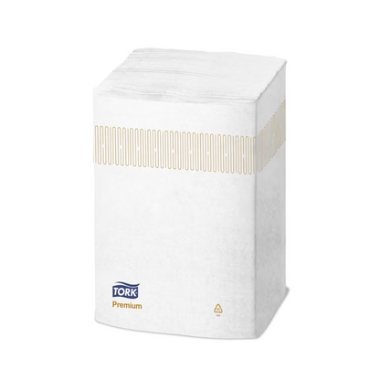 A stack of Premium Extra Soft Dispenser Napkins from the Tork Xpressnap® 15850 line by TORK – Essity Professional Hygiene Germany GmbH is packaged in a plastic wrap with a beige stripe pattern and the brand logo. This packaging emphasizes sustainability with a recycling symbol and is an example of the Tork Xpressnap design, which aims to reduce napkin consumption with every use.