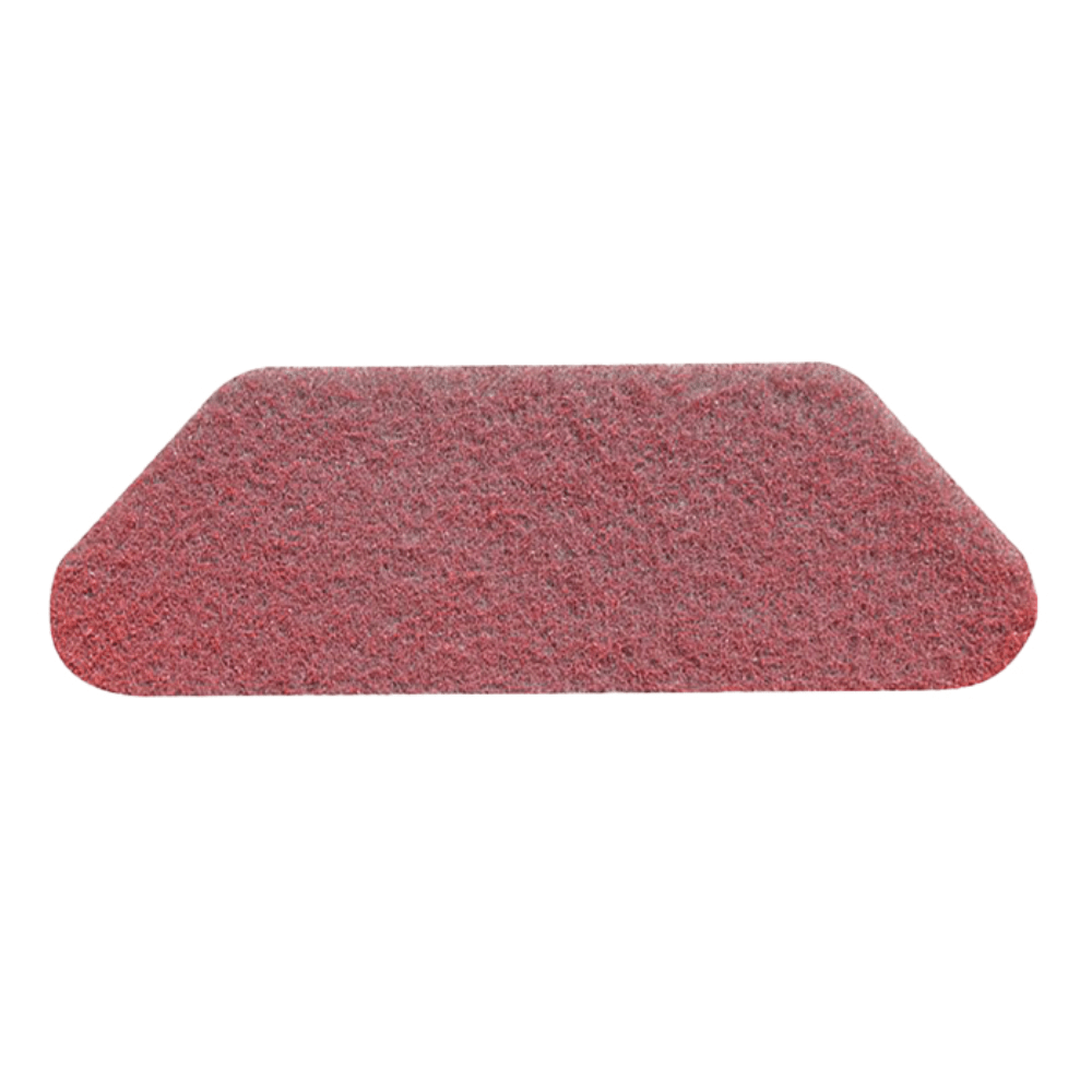 A rectangular Twister S-Pad Red (45x15 cm, 2 pcs.) from Diversey Germany with rounded corners lies on a white background - ideal for the basic cleaning of worn stone floors.