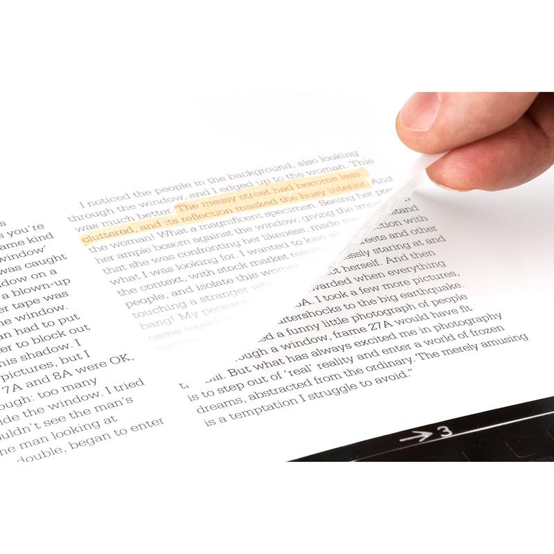 A hand lifts a transparent 3M Post-it® Note (73 mm x 73 mm, 36 sheets/block, 12 blocks/package) from a book page, showing the highlighted text while the printed text underneath remains visible.